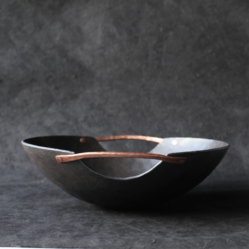 Handmade iron bowl with copper riveted handles